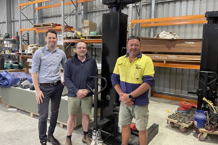 David Ridley, Andy Boardman and Luke Kauppila with mobile column hoist